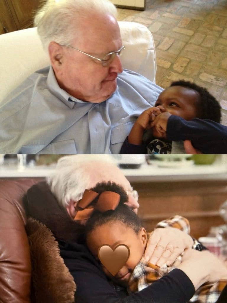 John Bullock lovingly holding his grandchildren