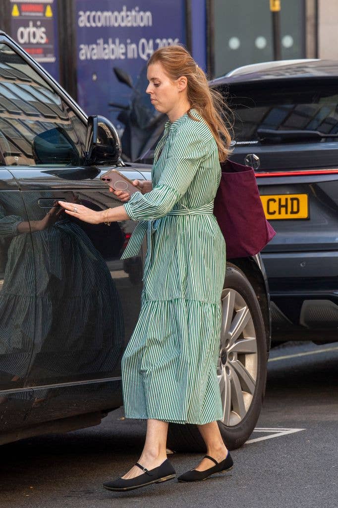 Princess Beatrice is seen for the first time since being absent from Royal Ascot. The Royal was running errands in Mayfair on the hottest day of the year. Beatrice was seen wearing a Cefinn Alice Belted Midi Dress and large Burgundy tote bag. 