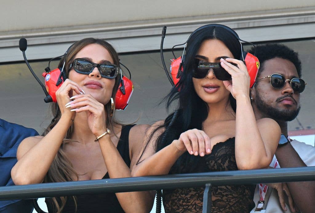 The sisters cheered on Kim's boyfriend Lewis Hamilton