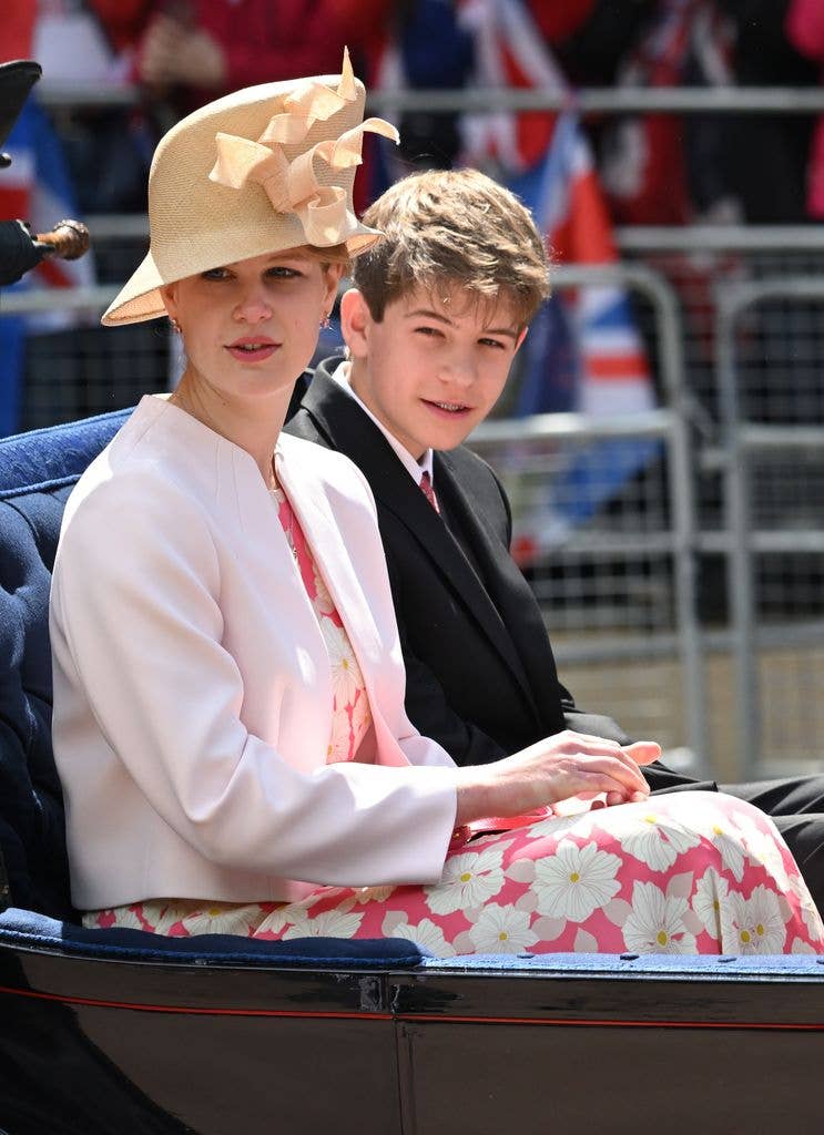 Lady Louise Windsor and James, Earl of Wessex riding in a carriage