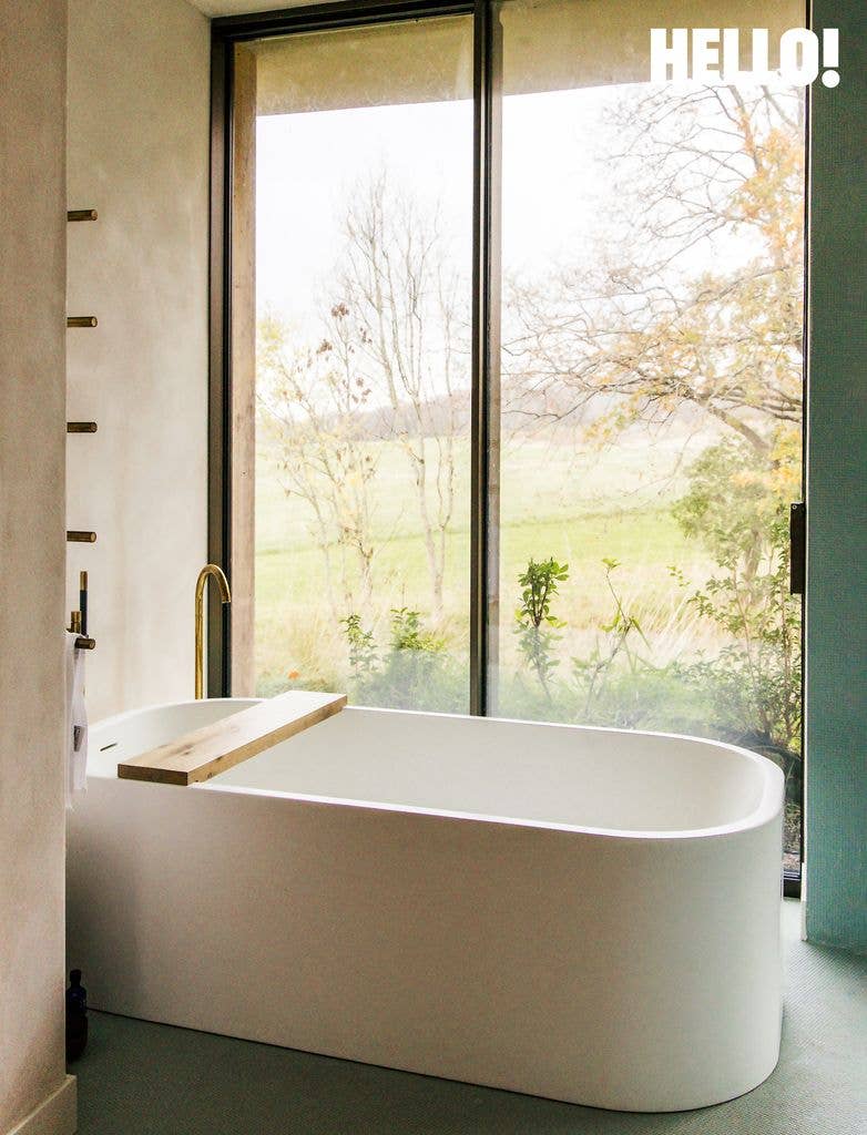 A cocoon bath with sweeping countryside views in their Cotswolds Leaf House