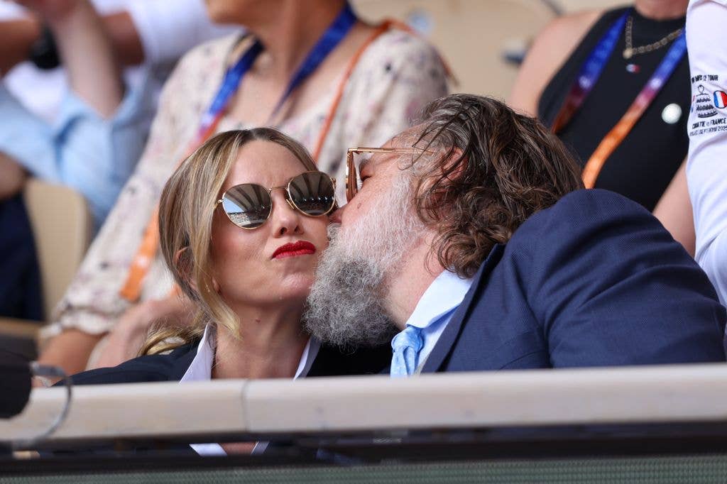 The pair shared loving moments court side at Roland-Garros