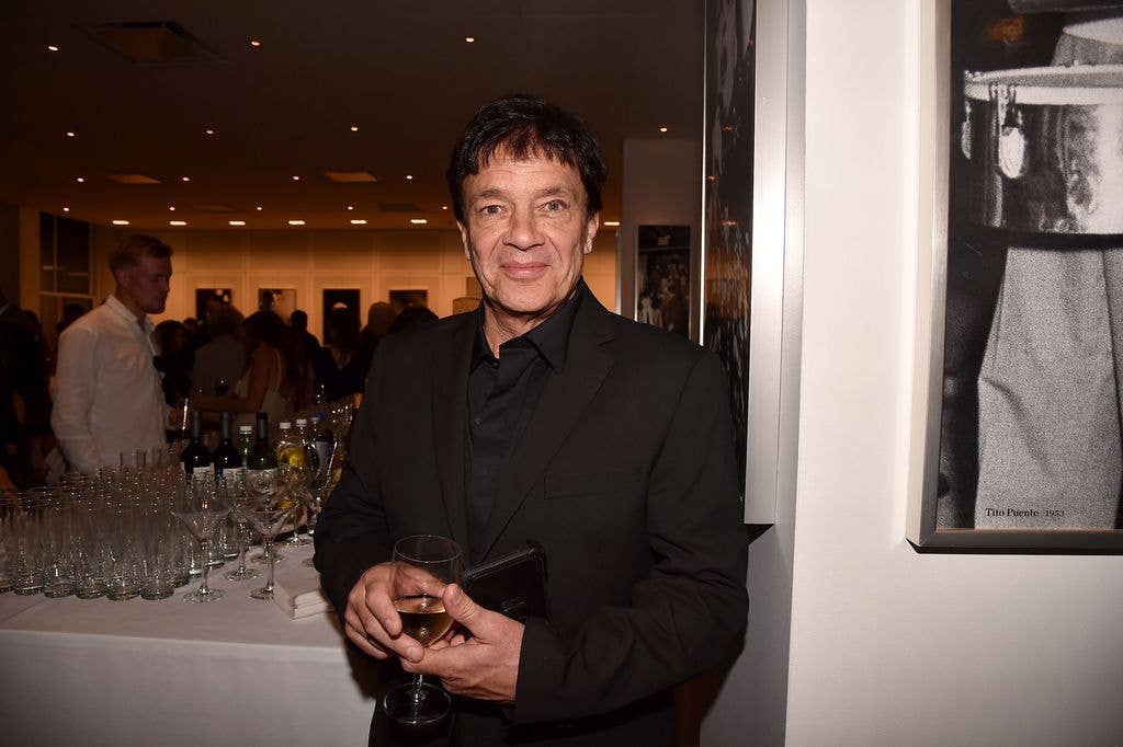 Zoltan Hargitay in a black suit holding a glass of wine in 2025.