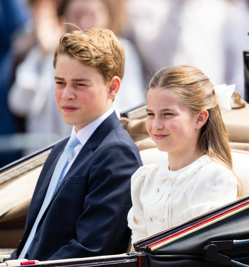 Prince George of Wales and Princess Charlotte of Wales travel by carriage