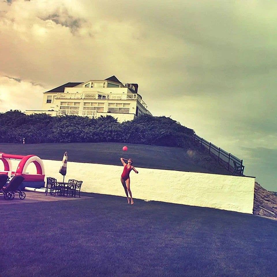 taylor swift in swimsuit in front of rhode island home