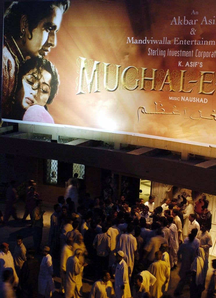 Pakistani cinema goers queue for tickets for Mughal e Azam in Lahore in 2006.