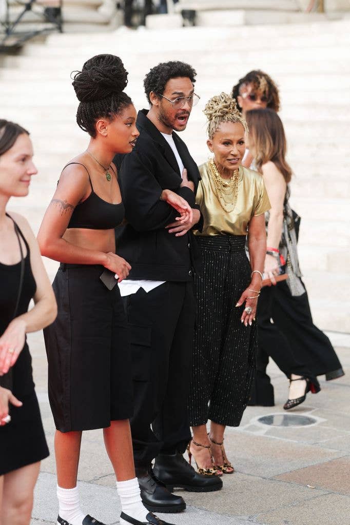 A photo of Willow Smith and her grandmother and brother