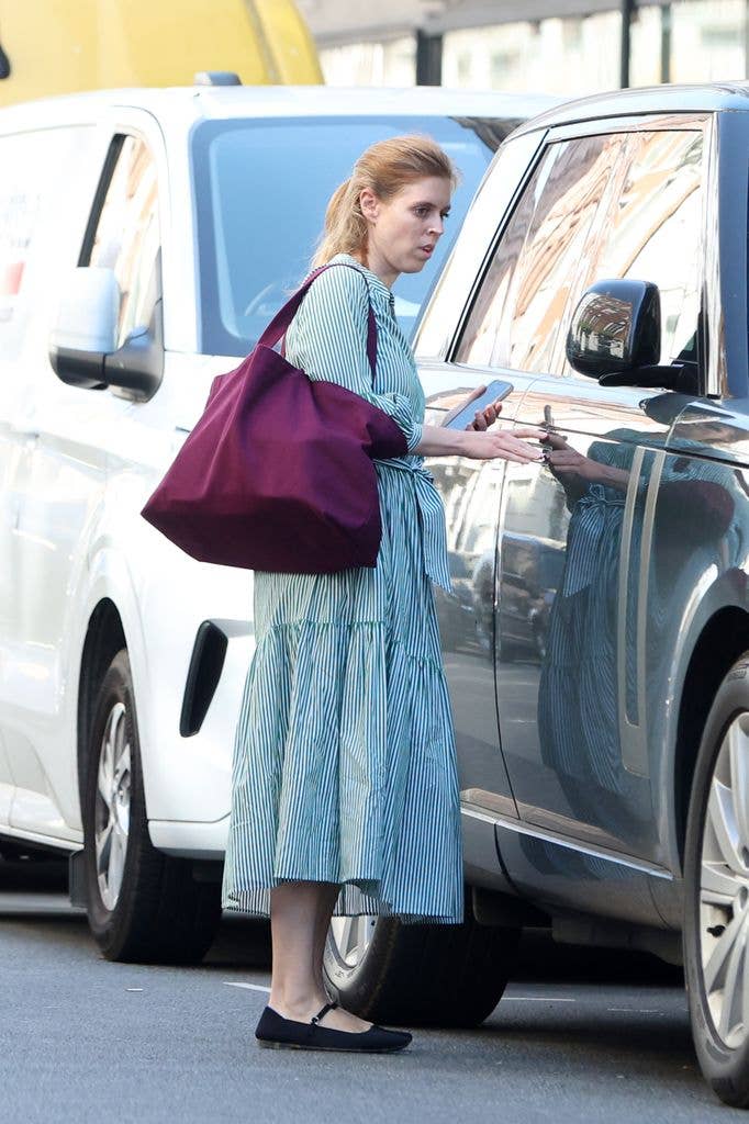 Princess Beatrice is seen for the first time since being absent from Royal Ascot. The Royal was running errands in Mayfair on the hottest day of the year. Beatrice was seen wearing a Cefinn Alice Belted Midi Dress and large Burgundy tote bag. 