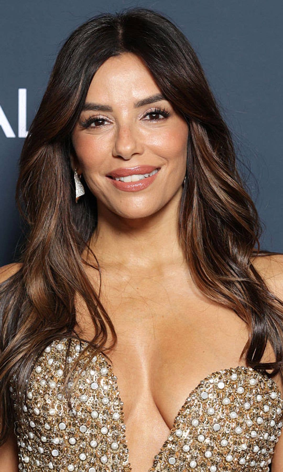 Eva Longoria attends Lights On Women's Worth during the 79th Cannes Film Festival looking glowy in a diamante dress