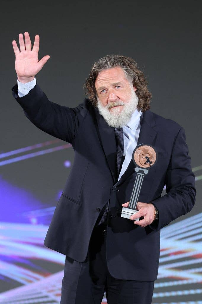Russell poses on stage during the 72nd Taormina Film Festival