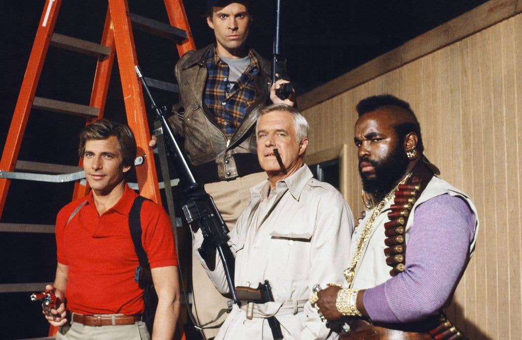 Dirk Benedict, George Peppard, Mr T and Dwight Schultz pose for a photograph.