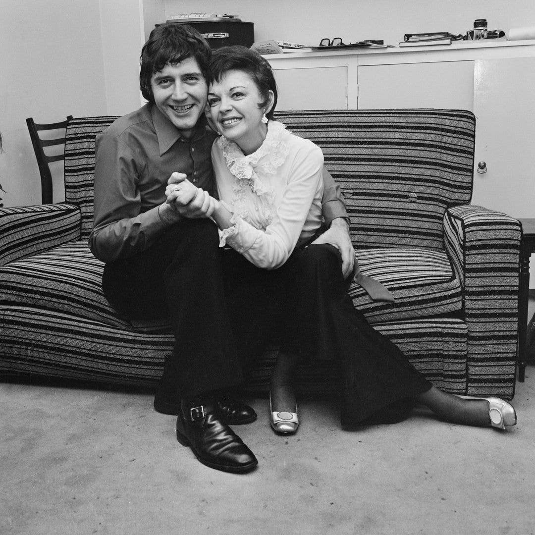 American actress and singer Judy Garland (1922-1969) posed with her new 5th husband to be Mickey Deans (1934-2003) at home on the morning of their wedding at Chelsea Register Office in London on 15th March 1969.
