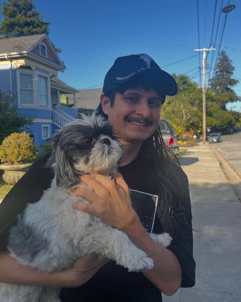 oliver tree holding dog