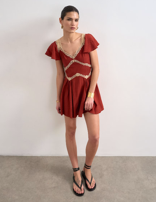 Flutter sleeve mini tea dress with lace inserts in rust
