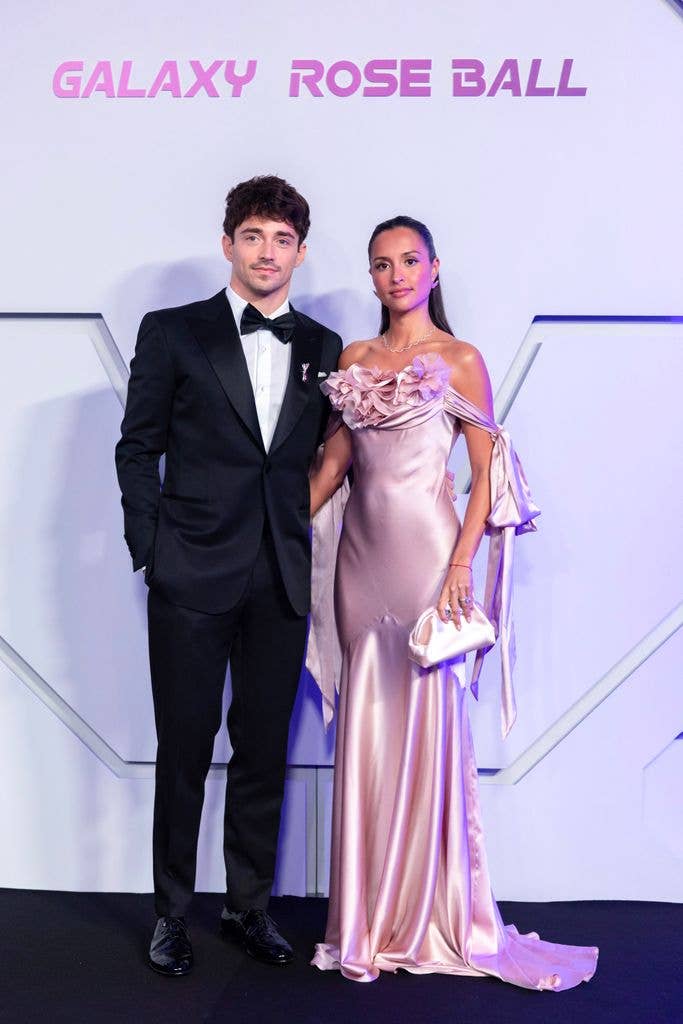 Charles Leclerc and his wife Alexandra Leclerc pose upon arrival for the 70th edition of the "Bal de la Rose" (Rose Ball) event at the Monte-Carlo Sporting Club in Monaco, on March 21, 2026. 