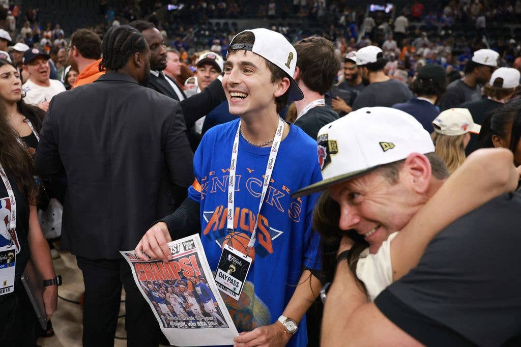 TimothÃ©e Chalamet celebrates after the New York Knicks' victory against the San Antonio Spurs in Game Five of the 2026 NBA Finals at Frost Bank Center on June 13, 2026 in San Antonio, Texas