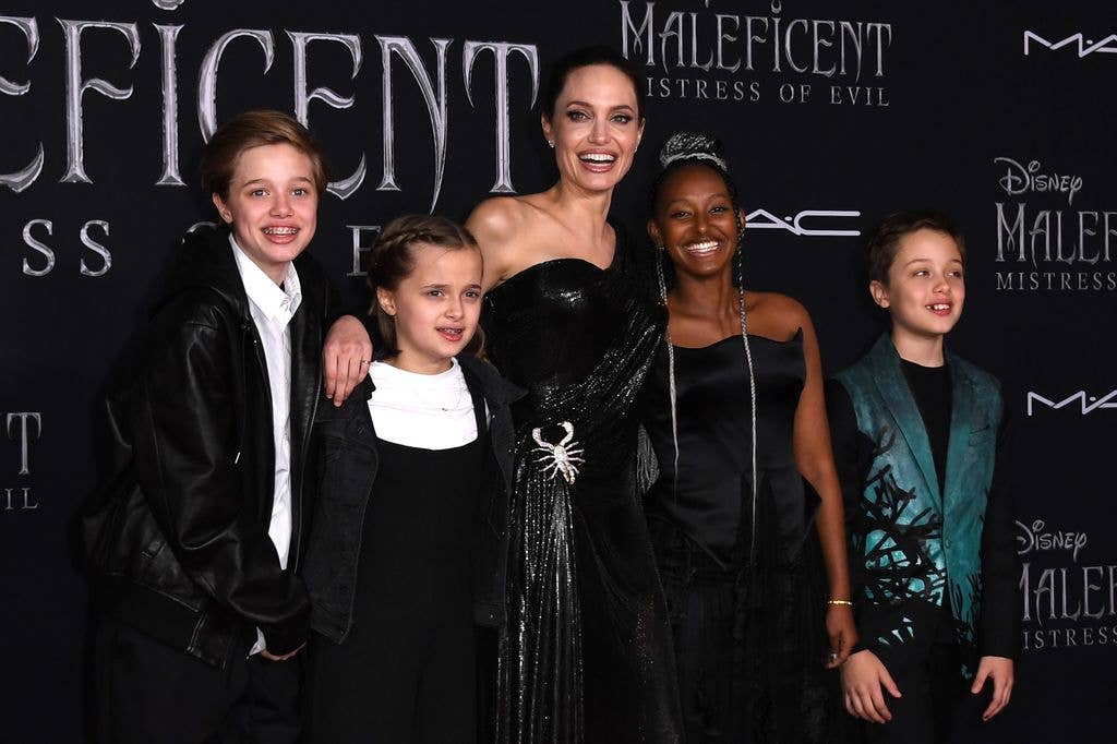 US actress Angelina Jolie (C) and children (fromL) Shiloh Nouvel Jolie-Pitt, Vivienne Marcheline Jolie-Pitt, Zahara Marley Jolie-Pitt, and Knox Leon Jolie-Pitt arrive for the world premiere of Disney's "Maleficent: Mistress of Evil" at the El Capitan Theatre in Hollywood on September 30, 2019.