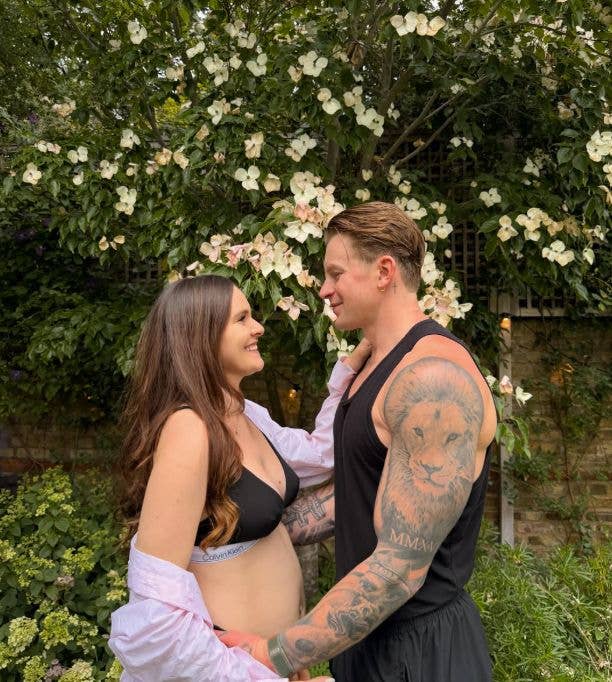 Holly Ramsay and Adam Peaty embracing