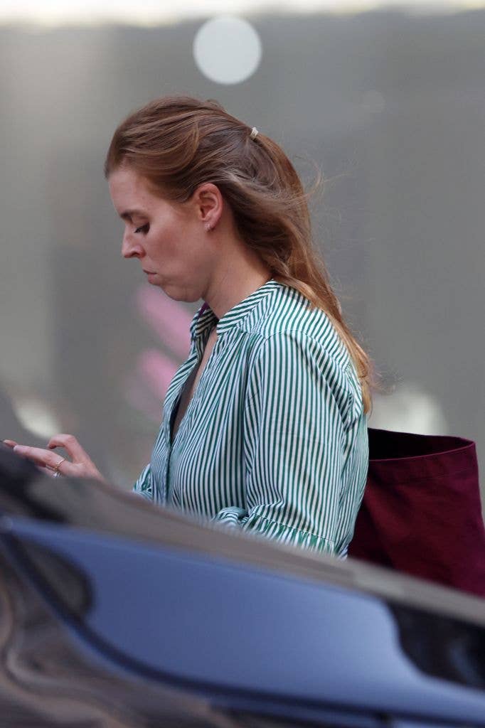 Princess Beatrice is seen for the first time since being absent from Royal Ascot. The Royal was running errands in Mayfair on the hottest day of the year. Beatrice was seen wearing a Cefinn Alice Belted Midi Dress and large Burgundy tote bag. 