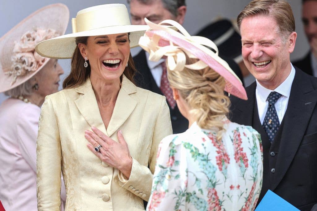 Britain's Catherine, Princess of Wales (L) and Sophie, Duchess of Edinburgh (C) laugh as they attend the annual Order of the Garter service at St. George's Chapel in Windsor Castle, 