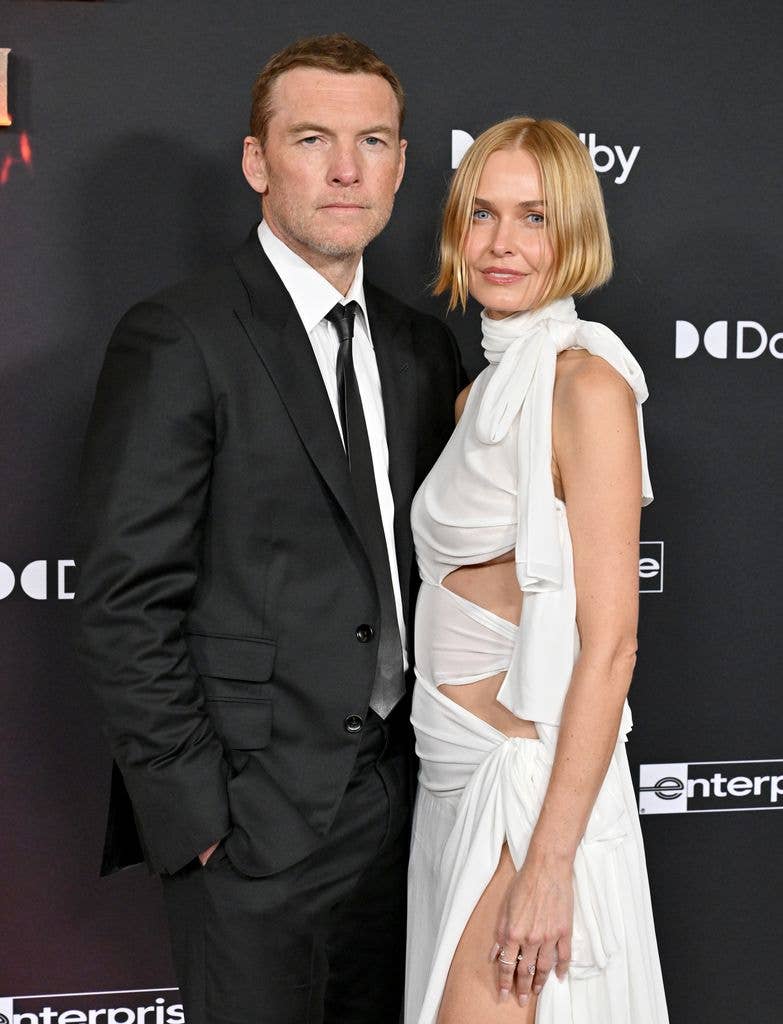 Sam Worthington and Lara Worthington attend the Global Premiere of 20th Century Studios' "Avatar: Fire and Ash" at Dolby Theatre on December 01, 2025 in Hollywood, California. (Photo by Axelle/Bauer-Griffin/FilmMagic)