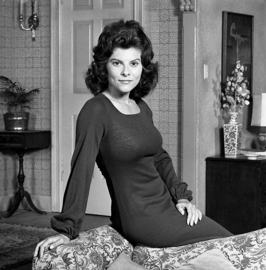 Adrienne Barbeau posing on the back of a sofa in 1972.