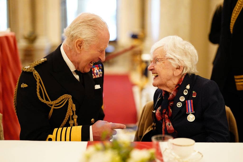 King Charles chatting with war veteran Ruth Barnwell 