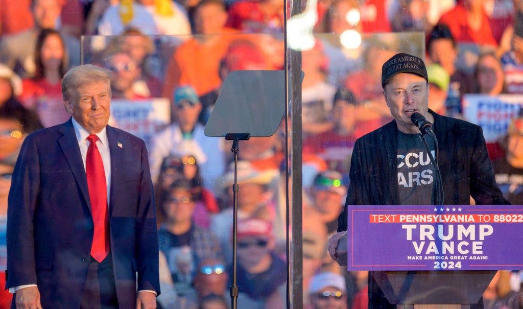 Elon Musk, Founder, CEO, and Chief Engineer of SpaceX joins former President Donald Trump at the Bulter Farm Show grounds for a rally on Saturday October 5, 2024