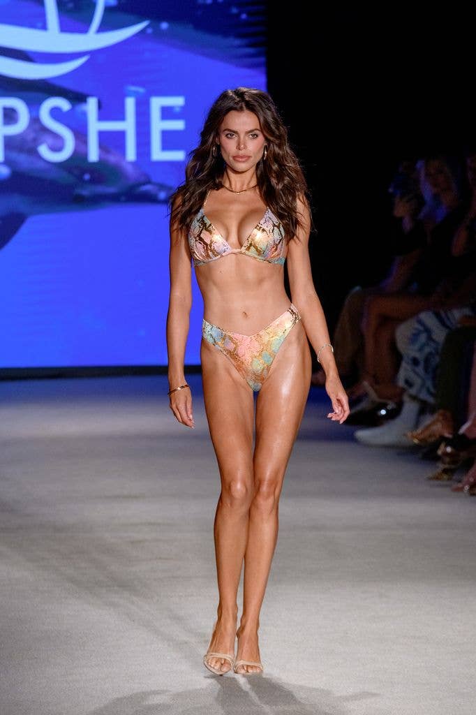 Brooks Nader walks the runway at the Cupshe show during the Paraiso Miami Swim Week 