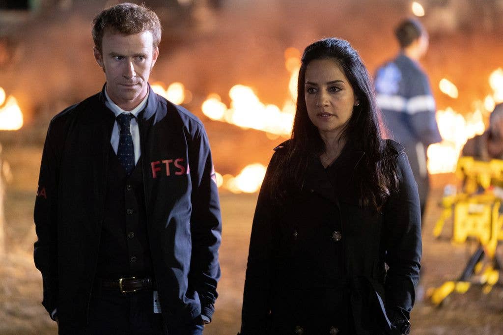 Mark Rendall and Archie Panjabi in Departure