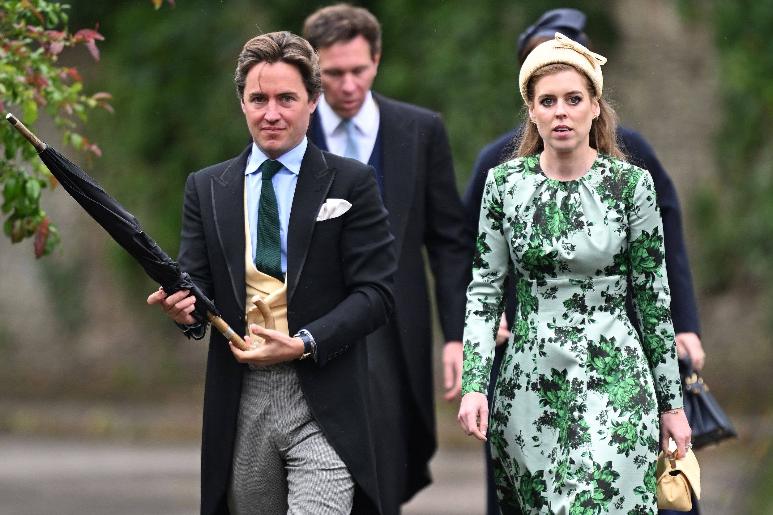 Edoardo Mapelli Mozzi, Jack Brooksbank and Princess Beatrice of York arrive for the Royal wedding of Peter Phillips and Harriet Sperling at All Saints Church