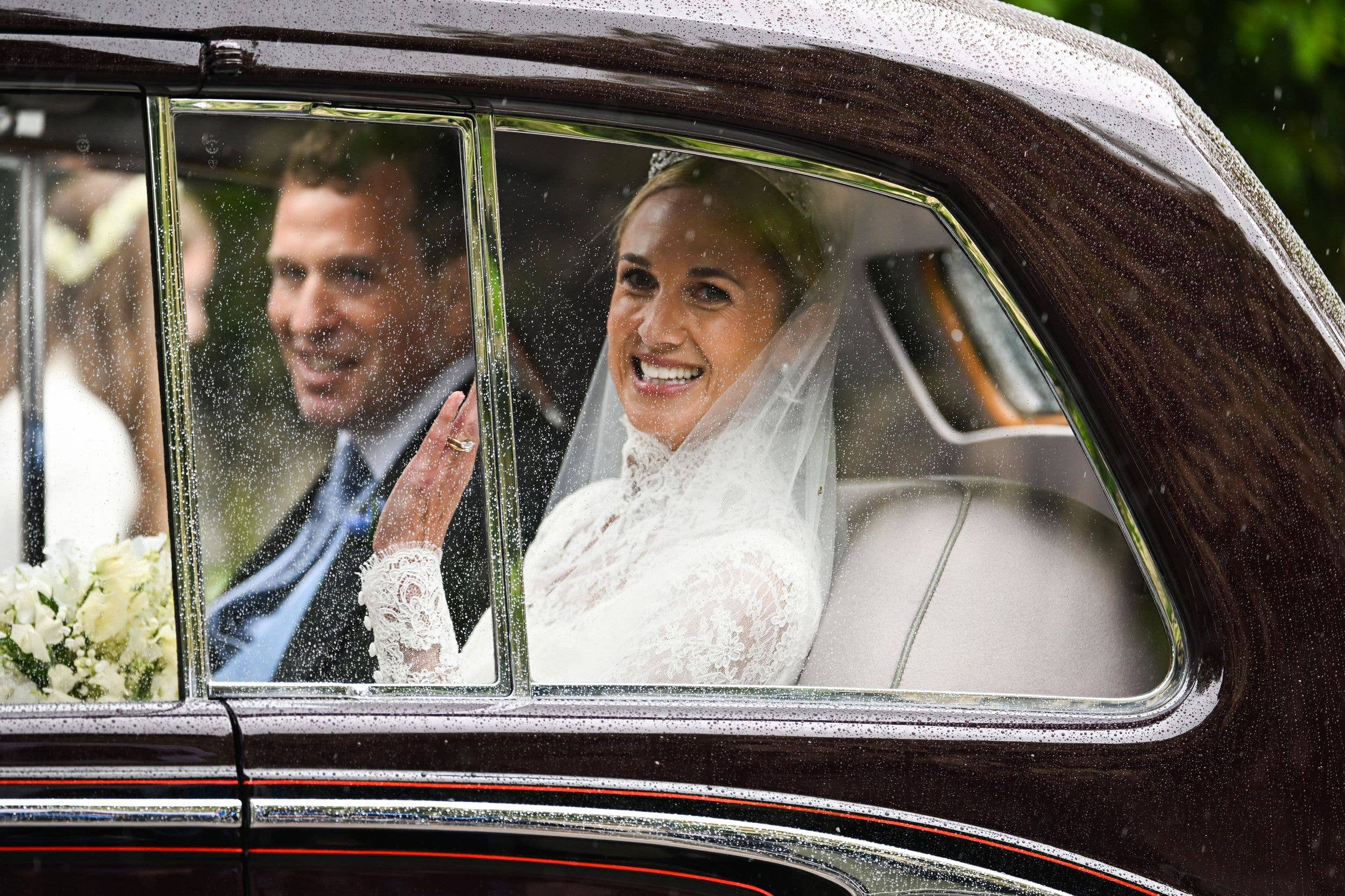 Peter Phillips and Harriet Sperling depart from their Royal wedding at All Saints Church in the car