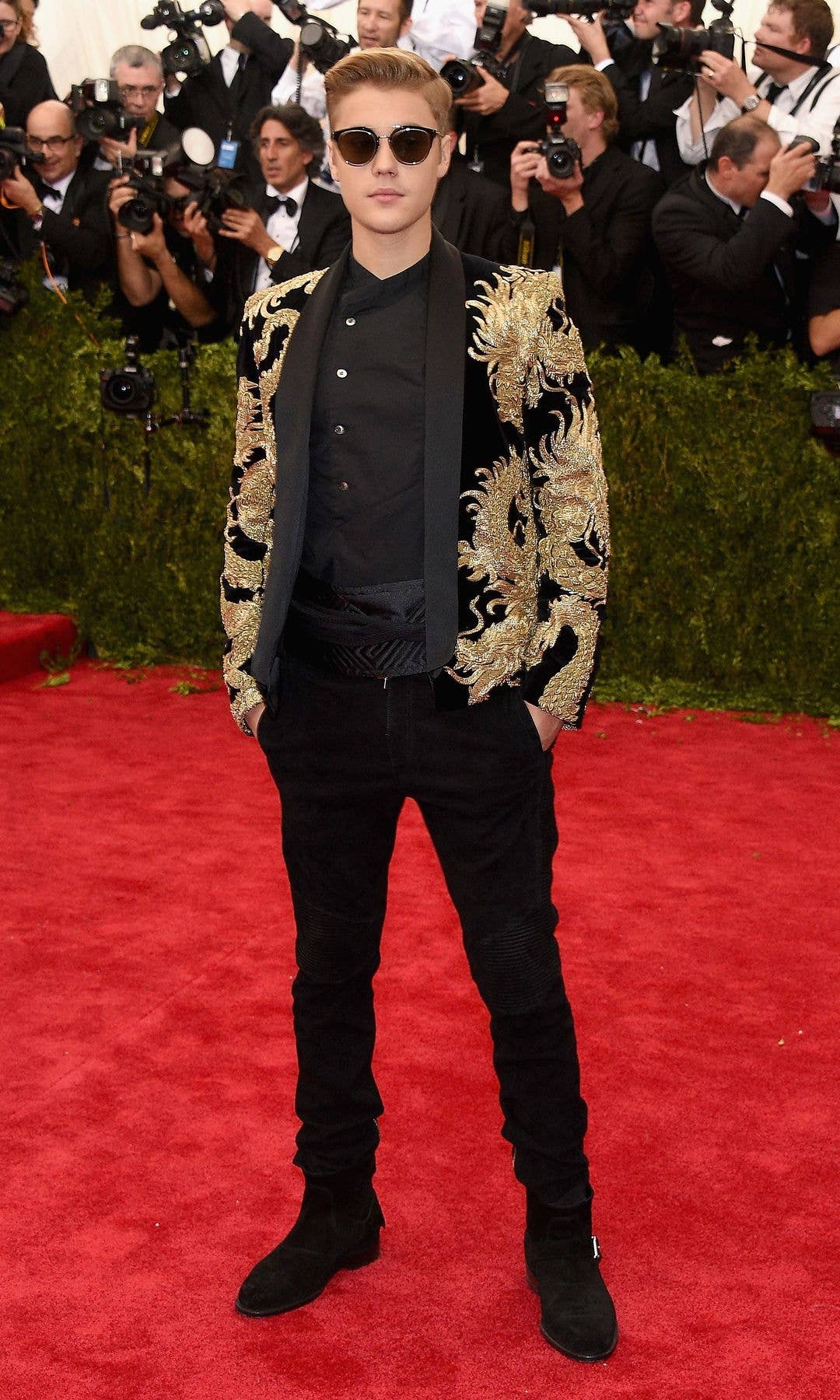 Justin Bieber attends the 2015 Met Gala wearing Balmain styled by Ugo