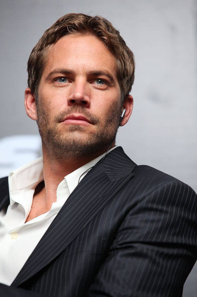 Paul Walker in a suit at a press conference for 'Fast & Furious'.