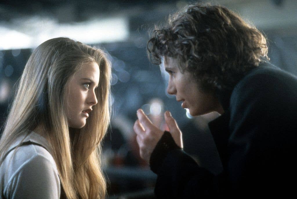 Alicia Silverstone listens to Jeremy Sisto in a scene from the film 'Hideaway', 1995