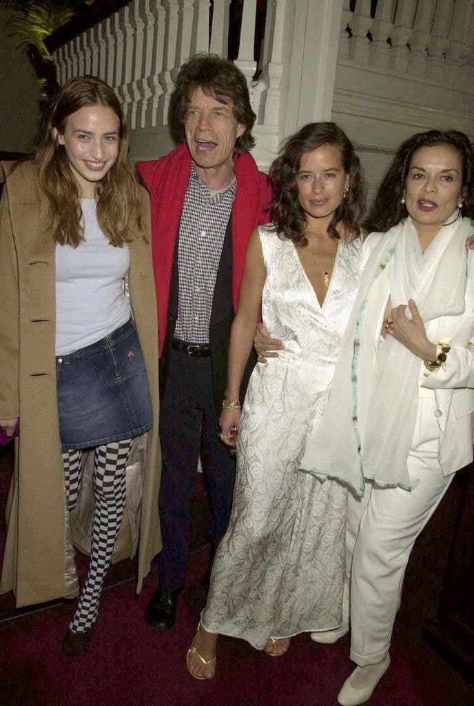 Mick Jagger standing with daughters Elizabeth and Jade