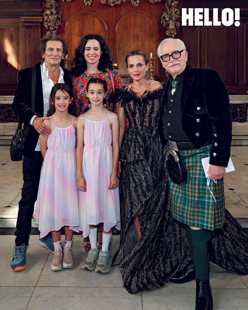 The pair with Ronnie Wood, his wife, Sally, and their twins, Alice and Gracie