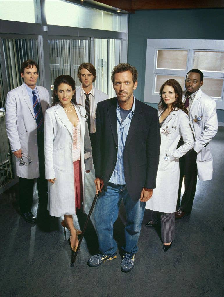 A photo of Hugh Laurie and the House cast