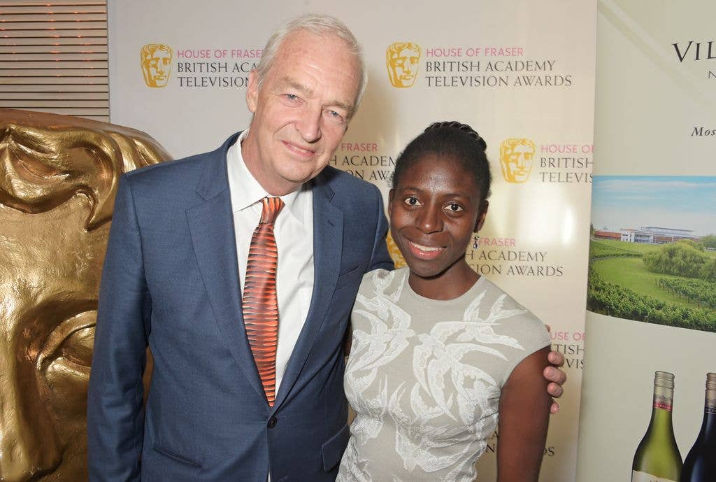 Jon Snow (L) and wife Precious Lunga attend a lunch to celebrate Jon Snow being awarded the BAFTA Fellowship at the Corinthia Hotel London on May 7, 2015 in London, England.  