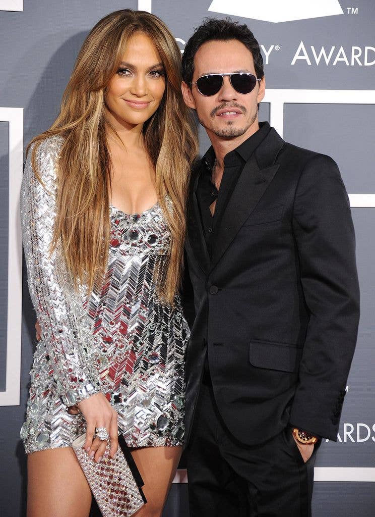 Jennifer Lopez in silver dress and Marc Anthony in black suit at The 53rd Annual GRAMMY Awards at Staples Center
