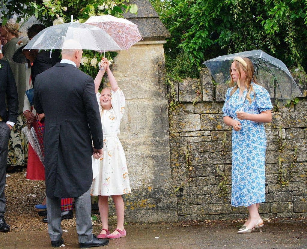 Mike Tindall with Mia and Lena Tindall at the wedding of Harriet Sperling to Peter Phillips at All Saints Church