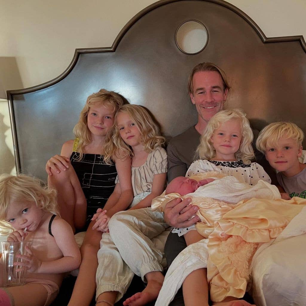 Kimberly shared a heartwarming photo of James in bed wih their children