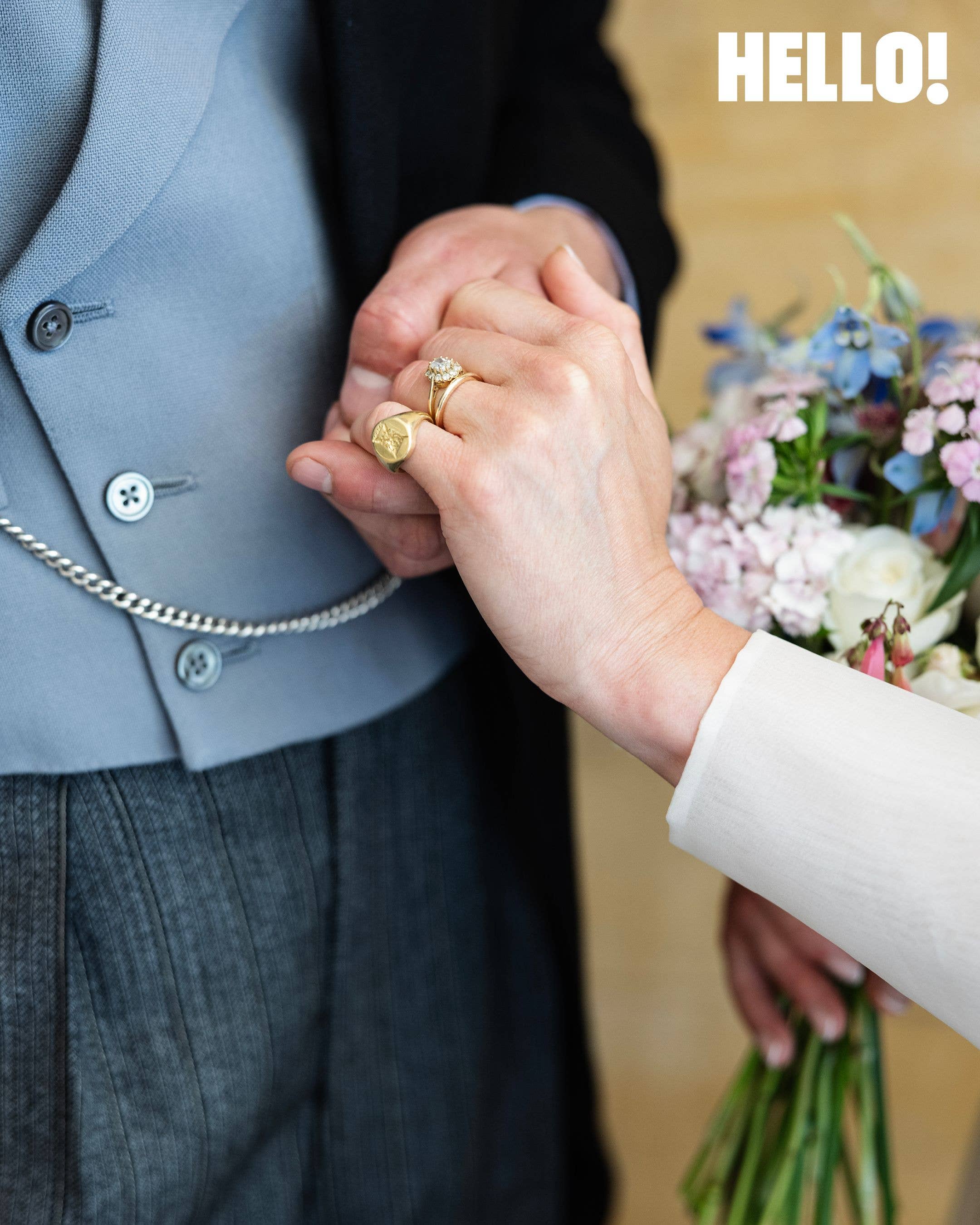 Madeleine's engagement ring is an antique cushion-cut diamond cluster ring. Her wedding ring was handcrafted by George's close friend, Zuleika Gerrish, of Parkin & Gerrish