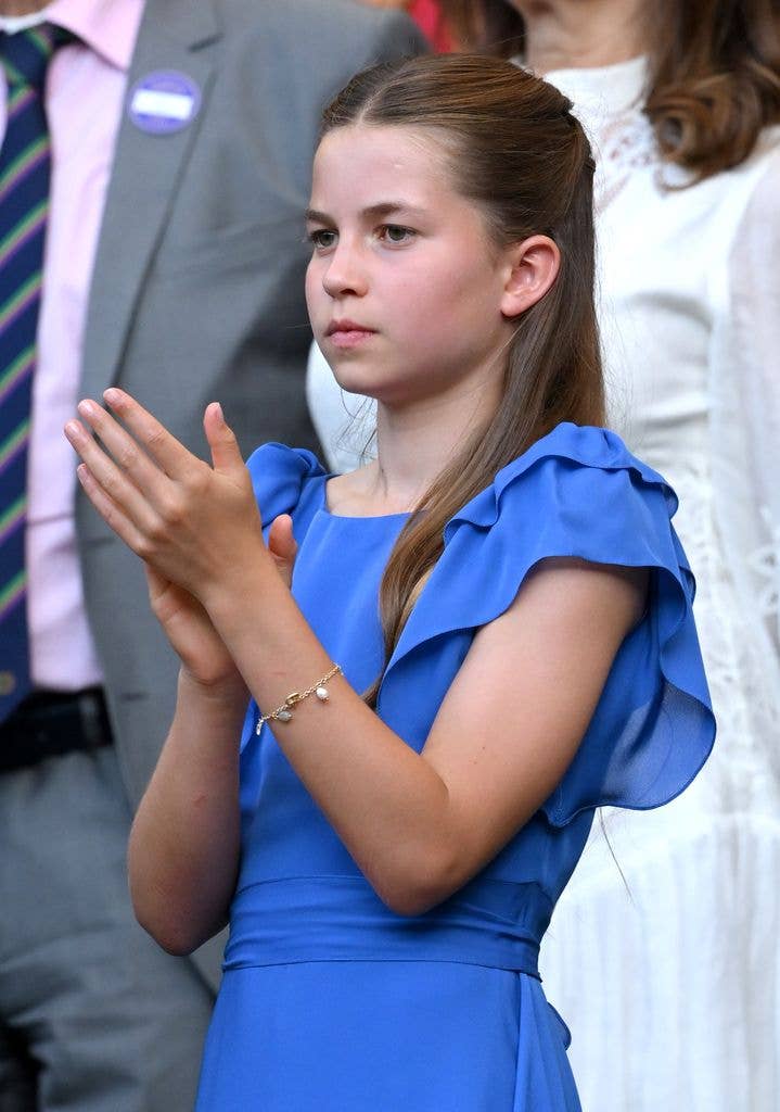 Charlotte's cornflower-blue dress perfectly complemented her polished new look