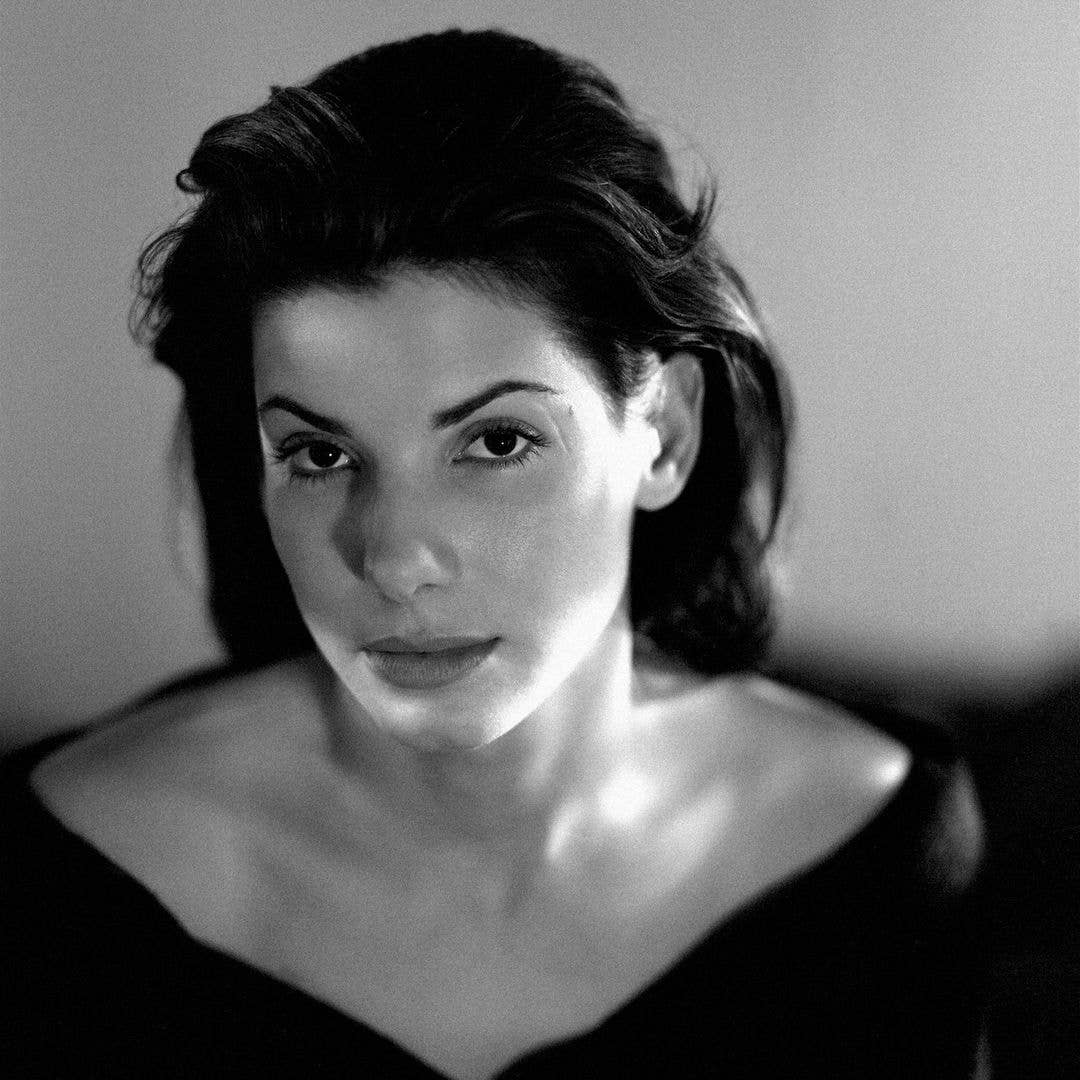 Actress Sandra Bullock poses for a photo shoot in 1993 at her residence in Los Angeles, California.