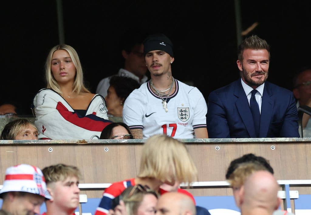 Harper Beckham watching a football match