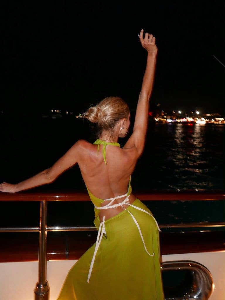 Another moment from Olympia's exciting trip saw her slip into a vintage Valentino co-ord