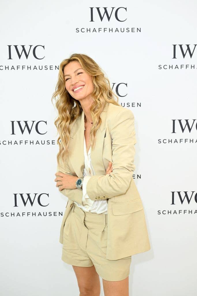 gisele bundchen smiling arms crossed