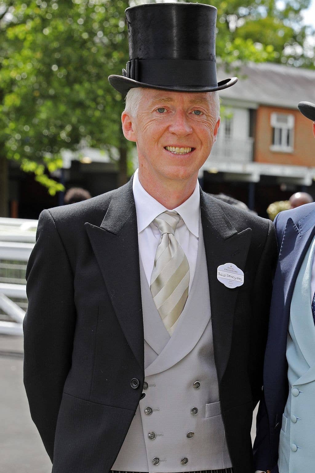 Philip Treacy in a tailcoat and top hat 