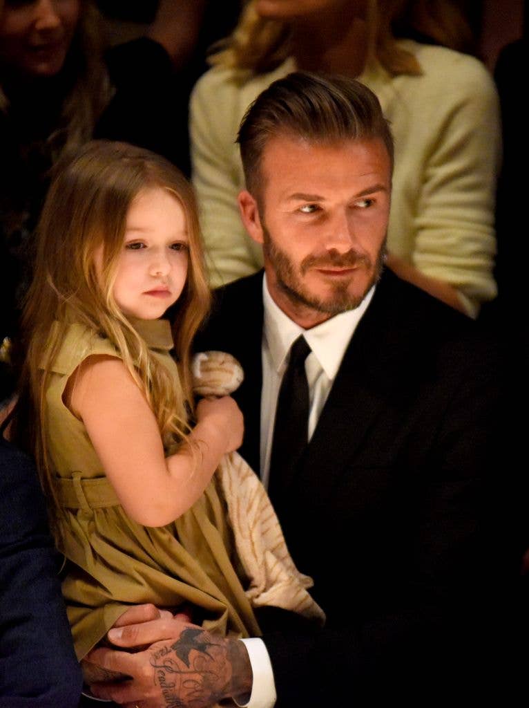  Harper Beckham (L) and David Beckham attend the Burberry "London in Los Angeles" event at Griffith Observatory on April 16, 2015 in Los Angeles, California. 